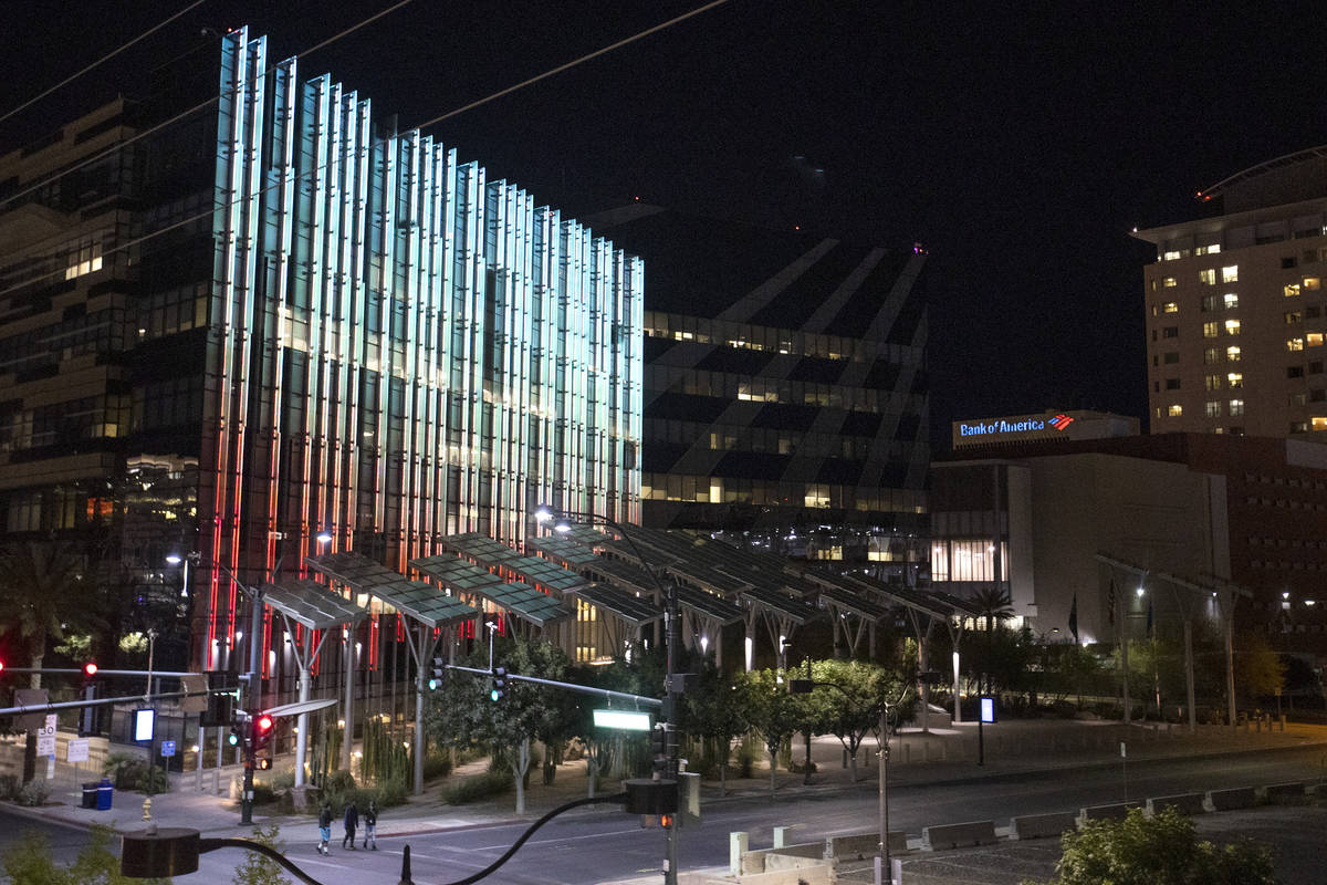 In this June 8, 2020, file photo, Las Vegas City Hall are lit up with crimson and gold. (Ellen ...