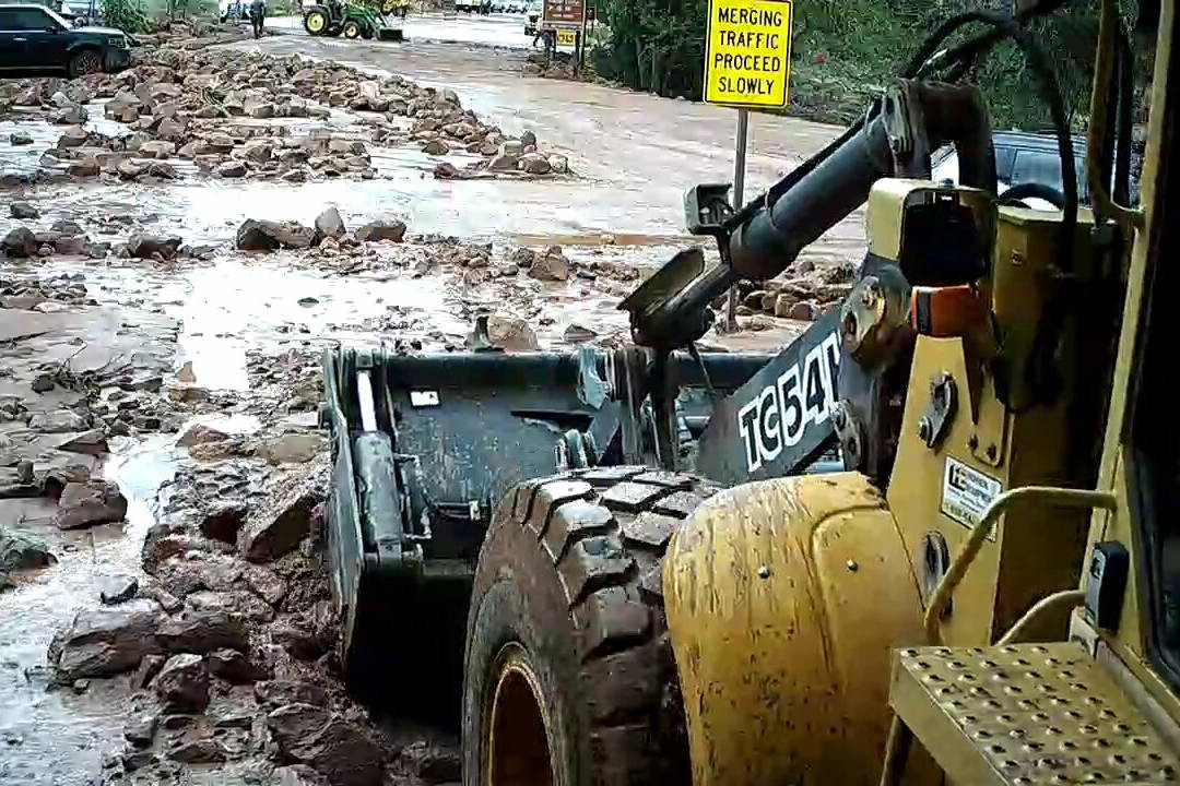 Workers clean up at Zion National Park after flash flooding on Tuesday. (National Park Service)
