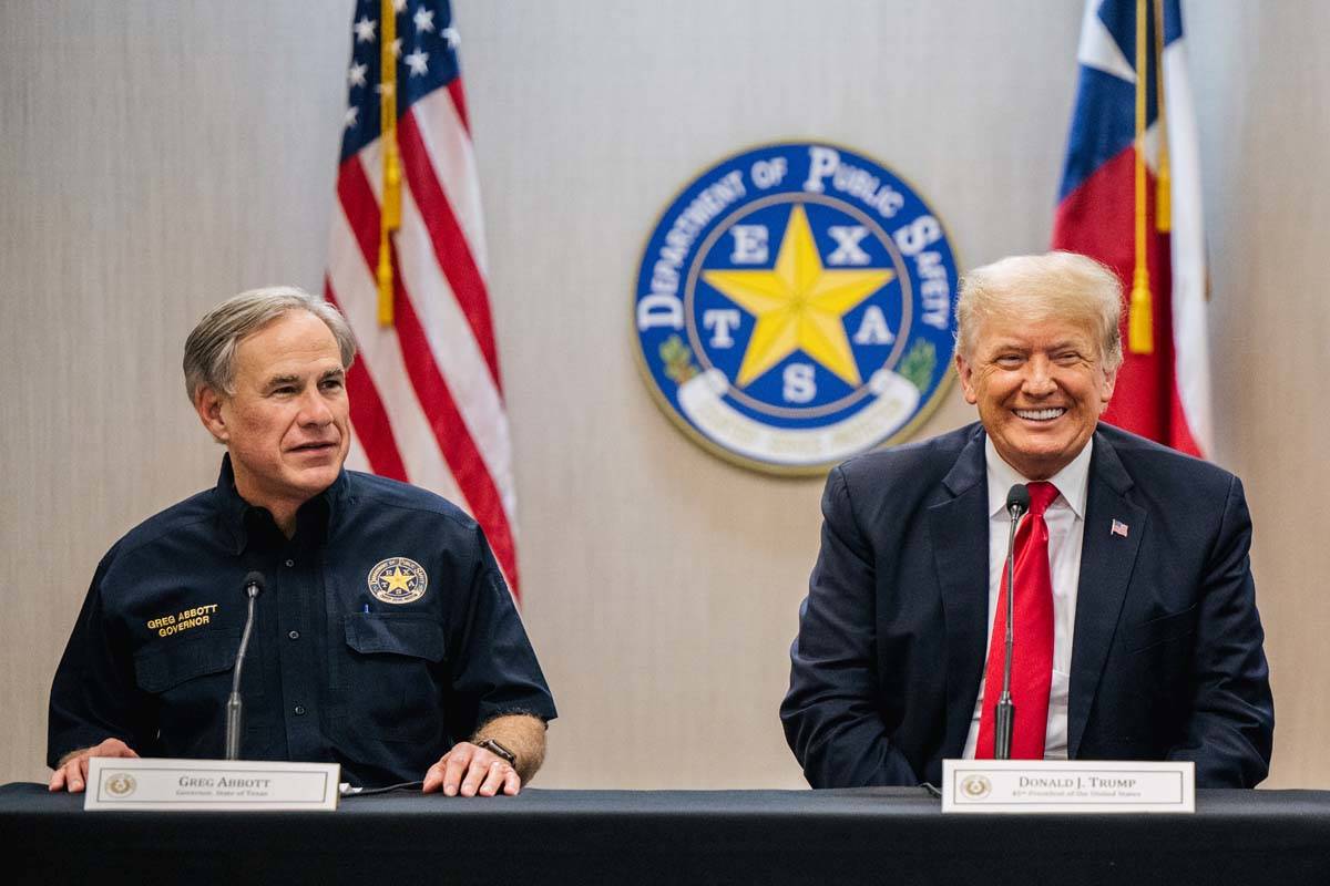 Texas Gov. Greg Abbott addresses former President Donald Trump during a border security briefin ...