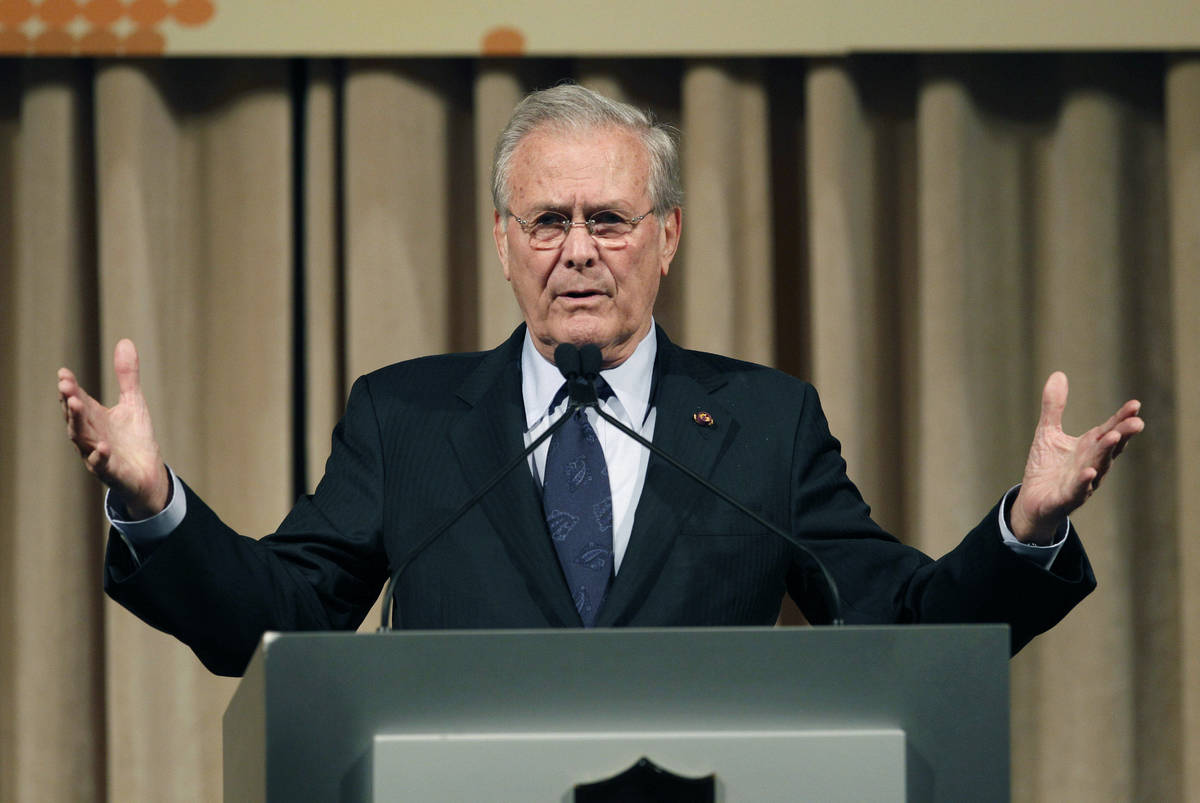 FILE - In this Oct. 11, 2011, file photo, former U.S. Secretary of Defense Donald Rumsfeld spea ...