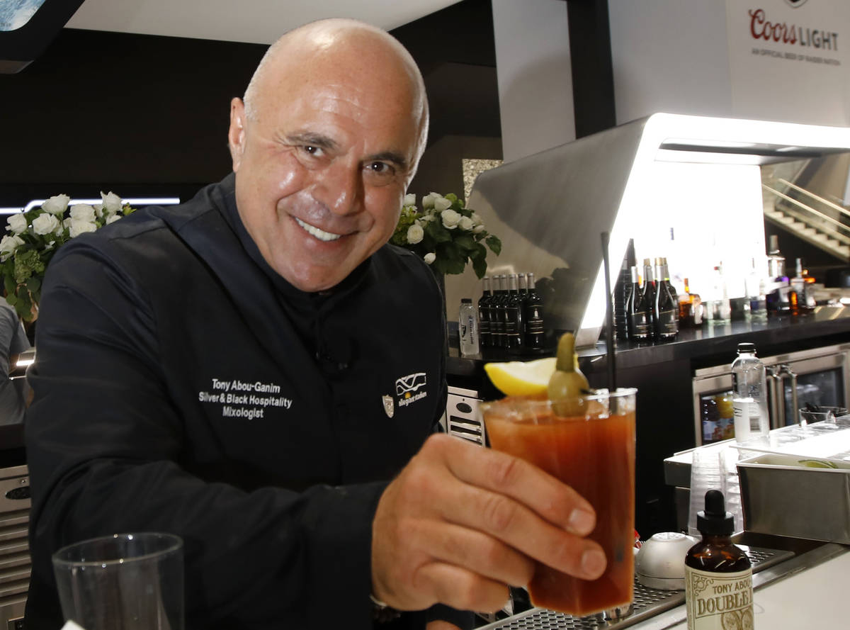 Mixologist Tony Abou-Ganim of Silver & Black Hospitality serves a cocktail, Bloody Fist Mar ...