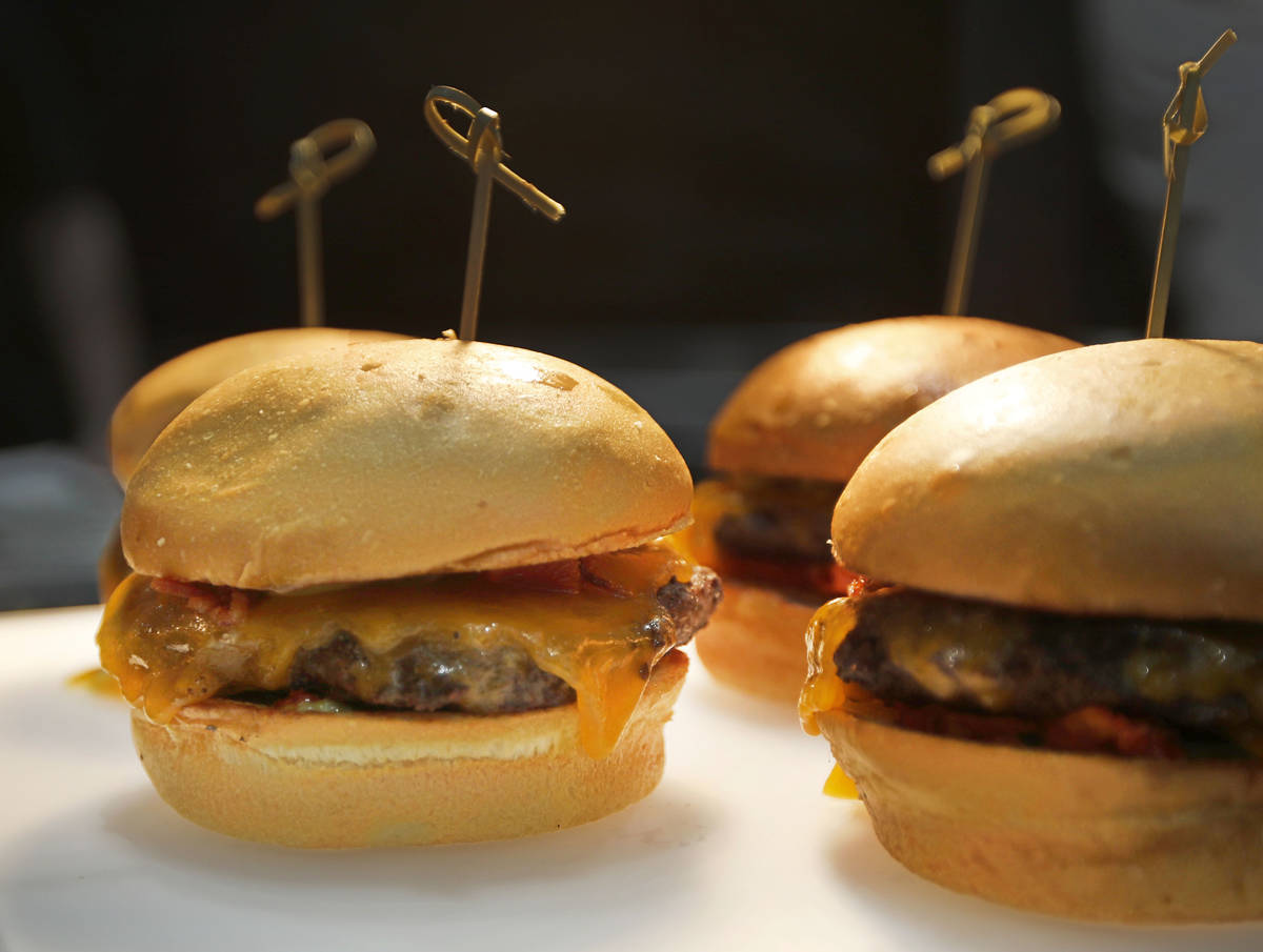 Holsteins' Gold Standard Burgers are served during an event of food and beverage experience at ...
