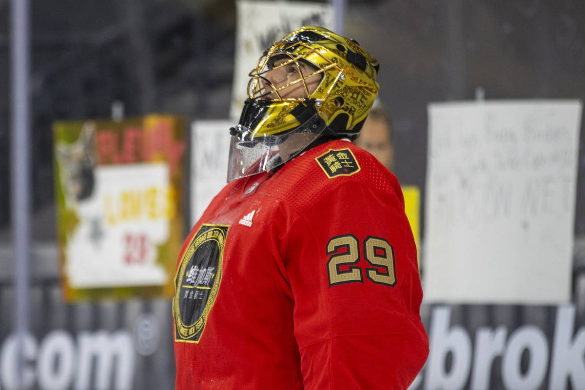 Golden Knights goaltender Marc-Andre Fleury (29) looks up during warm ups before the first peri ...