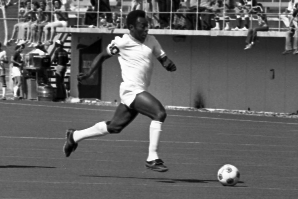 Pele leads the New York Cosmos against the Las Vegas Quicksilvers at what was then known as Las ...