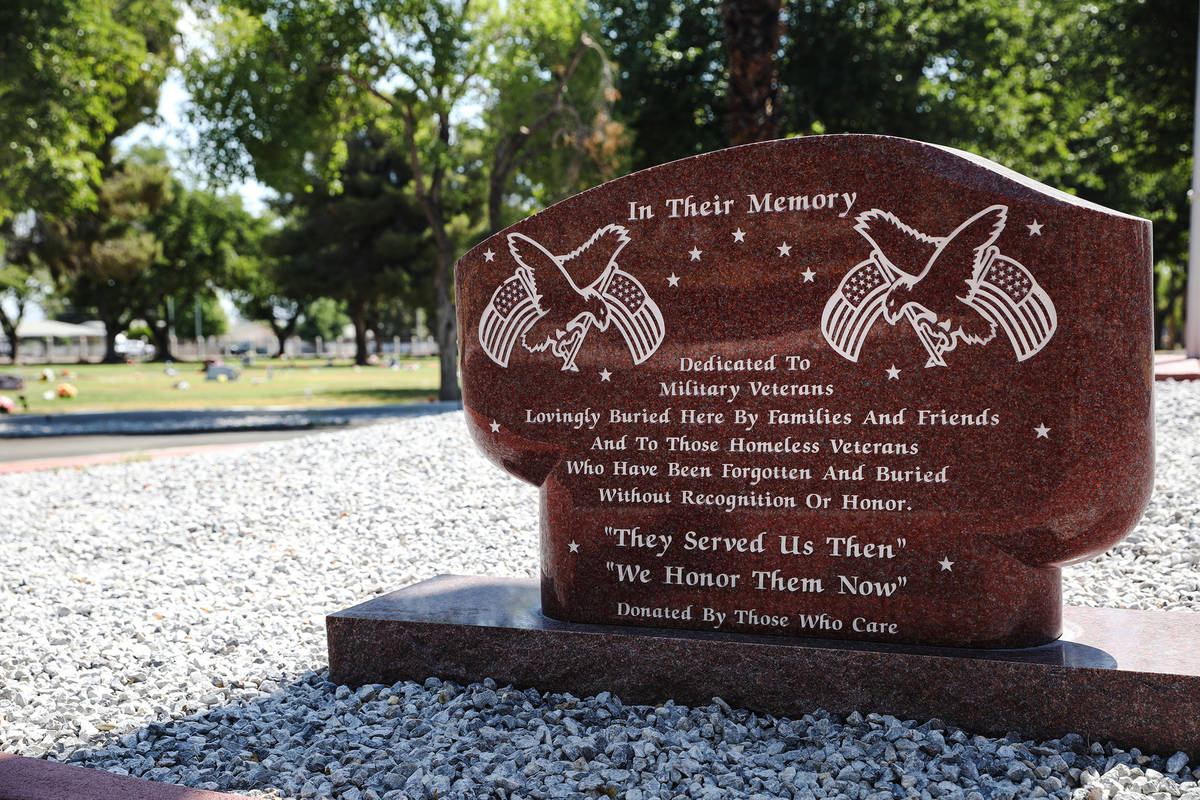 A plaque commemorating veterans buried at Woodlawn Cemetery in Las Vegas is pictured on June 24 ...