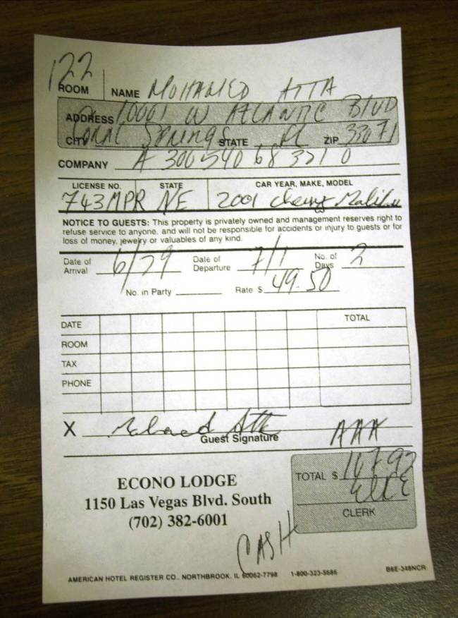 A copy of a June 29, 2001, Econo Lodge check-in slip signed by Mohamed Atta, who piloted Americ ...