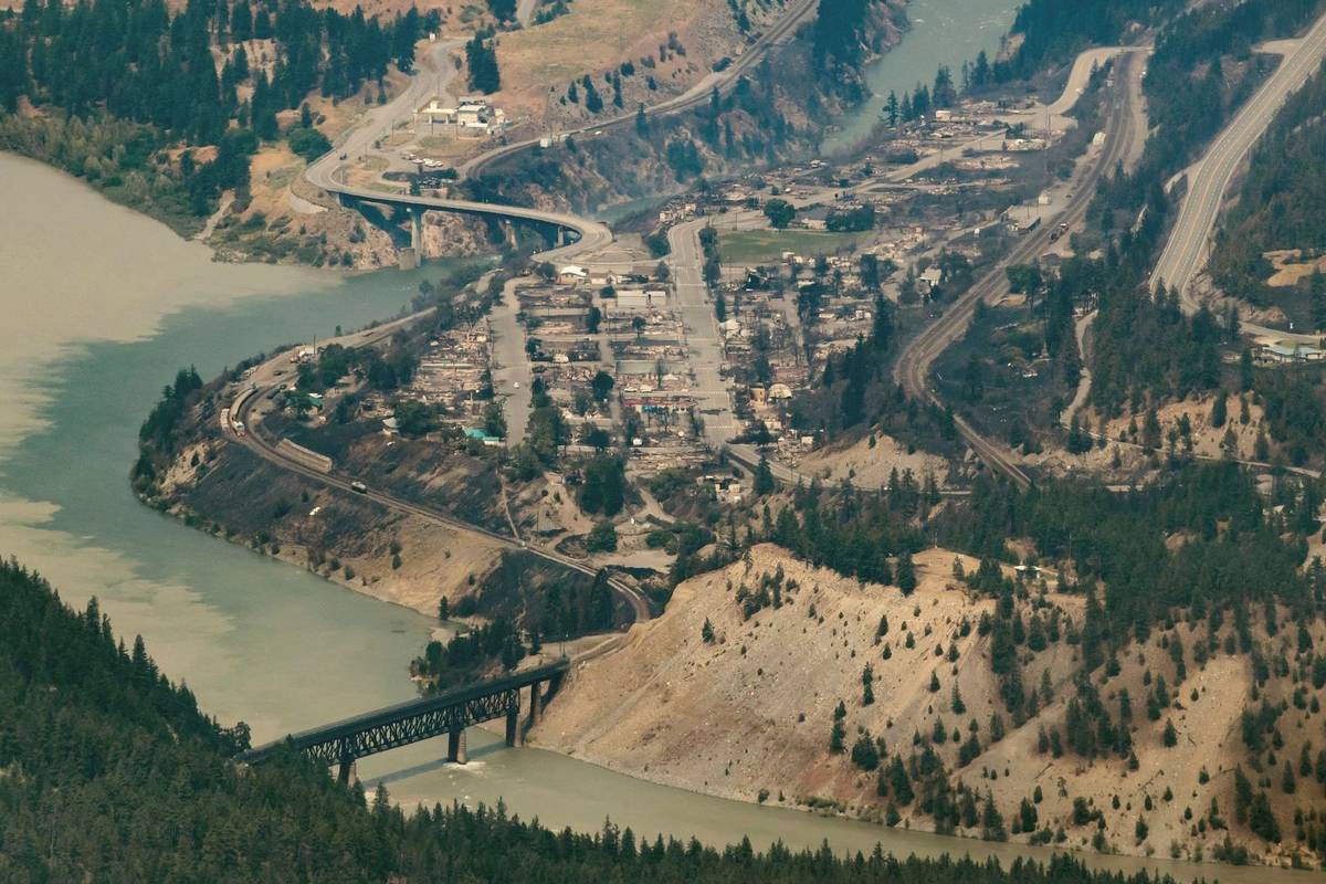 Structures destroyed by a wildfire are seen in Lytton, British Columbia, on Thursday, July 1, 2 ...