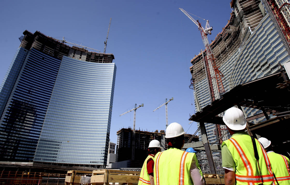 Workers look up at Vdara on the Strip on Thursday, May 8, 2008, in Las Vegas. (Las Vegas Review ...