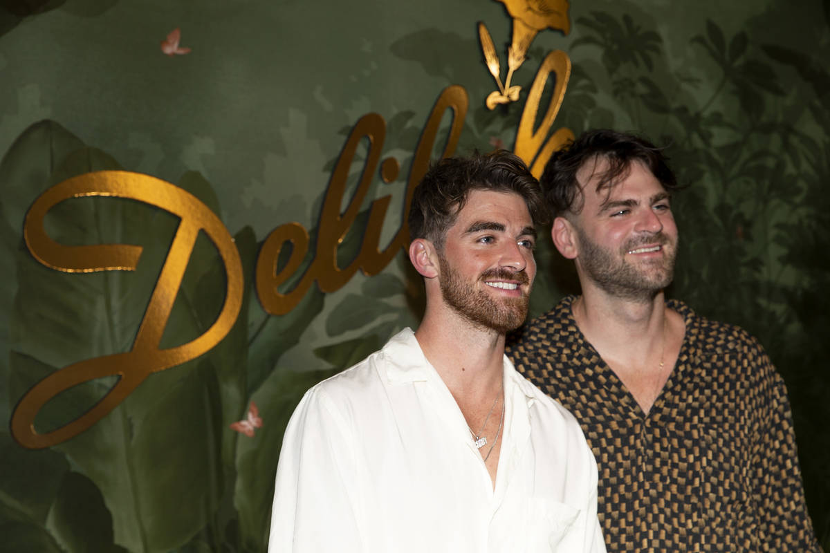 Andrew Taggart, left, and Alex Pall, members of electronic duo The Chainsmokers, pose for photo ...