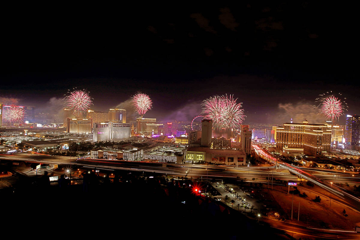 Fireworks explode above the Las Vegas skyline, as seen from the VooDoo Rooftop Nightclub at the ...