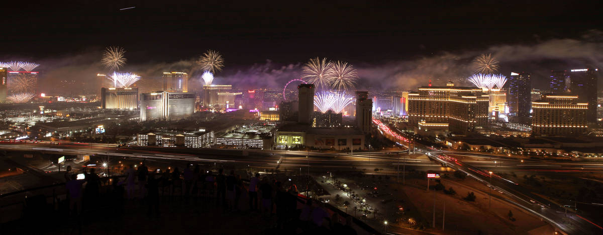 Fireworks explode above the Las Vegas skyline, as seen from the VooDoo Rooftop Nightclub at the ...