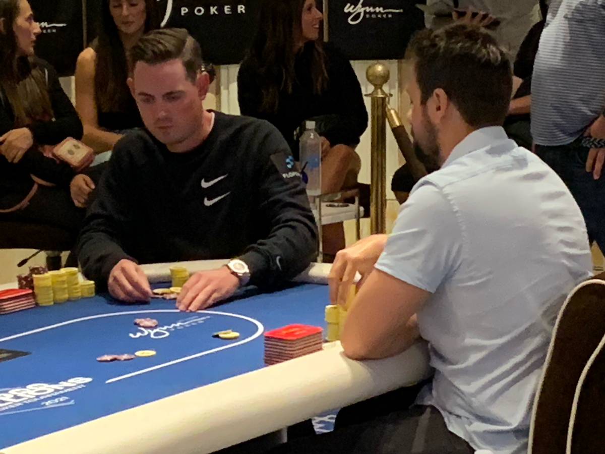 Toby Lewis, left, plays at the final table of the Wynn Millions on Saturday, July 3, 2021, at t ...