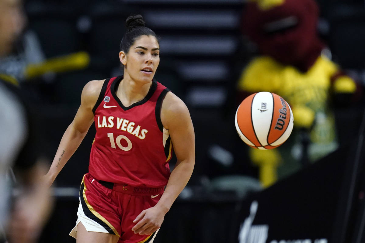 Las Vegas Aces' Kelsey Plum in action against the Seattle Storm during WNBA basketball game Sat ...