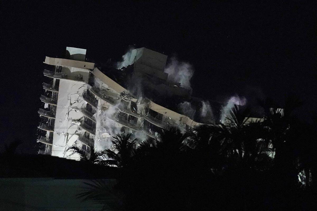 Demolition teams bring down the unstable remainder of the Champlain Towers South condo building ...