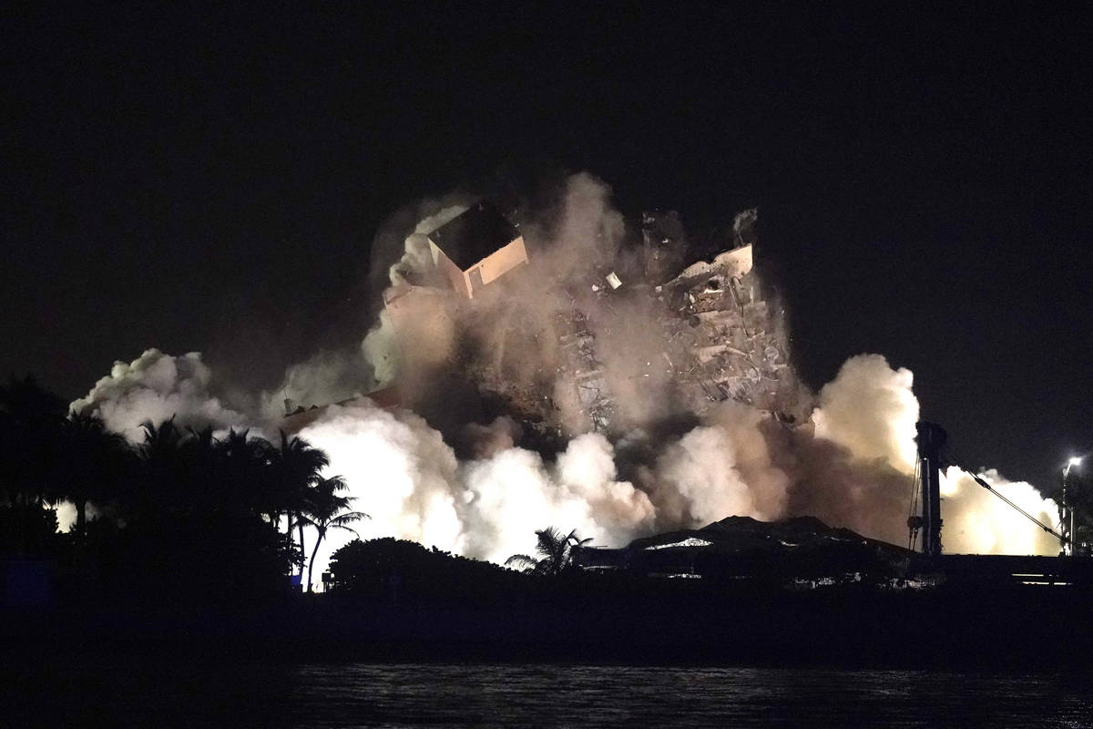 The remaining structure of the Champlain Towers South condo building is demolished more than a ...