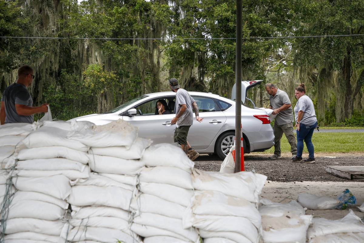 Park rangers Kevin Anderson, Chad Cash, Antonio Valdez and Elizabeth Peterson work together to ...