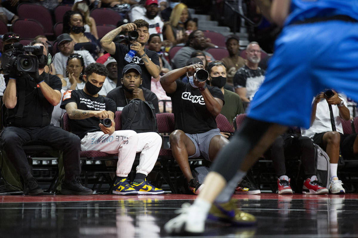 Balldawgs CEO Neal Carter, third from left, helps to film a BIG3 basketball league game between ...