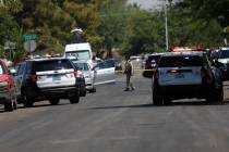 Las Vegas police investigate around Euclid Avenue near Oakey Boulevard after a man was shot and ...