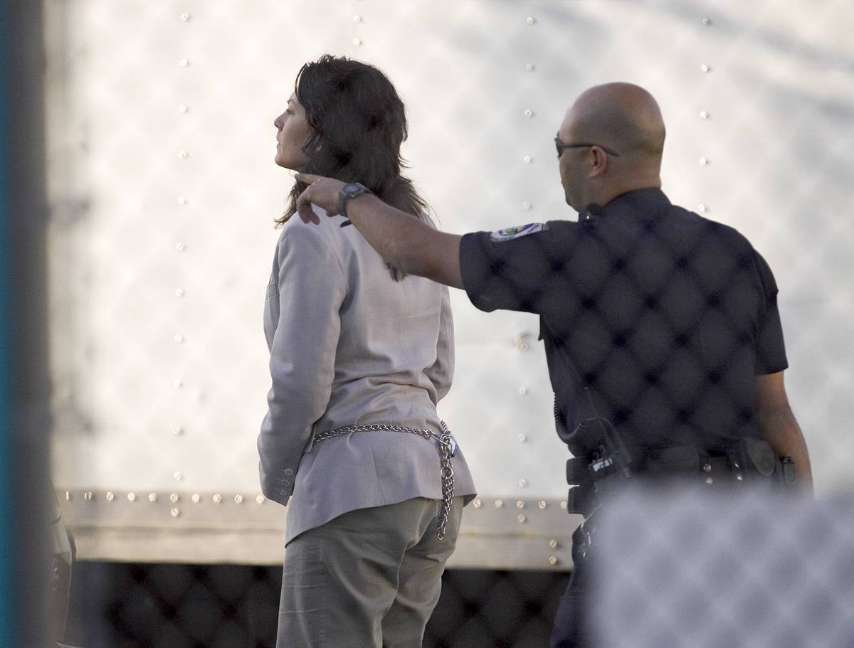 Heather Catherine Tallchief is escorted to the Clark County Detention Center in Las Vegas Thurs ...