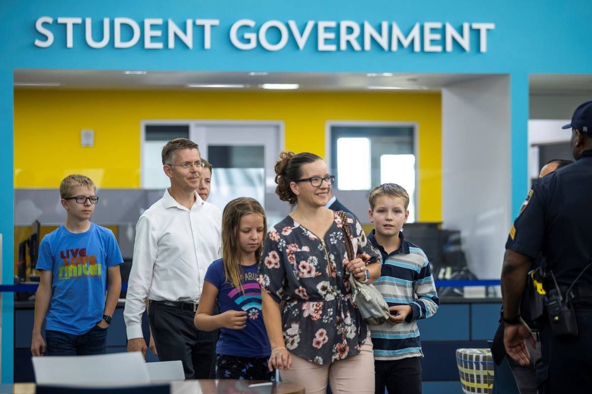 Student winner Zachary S. (Right) arrives with his family as Governor Steve Sisolak and Immuniz ...