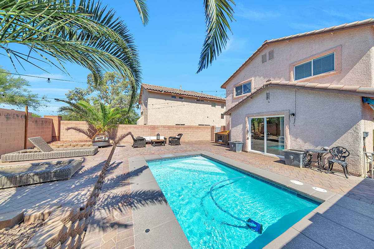 The pool and patio of 11016 Calder Ave. (Quick Pic Tours)