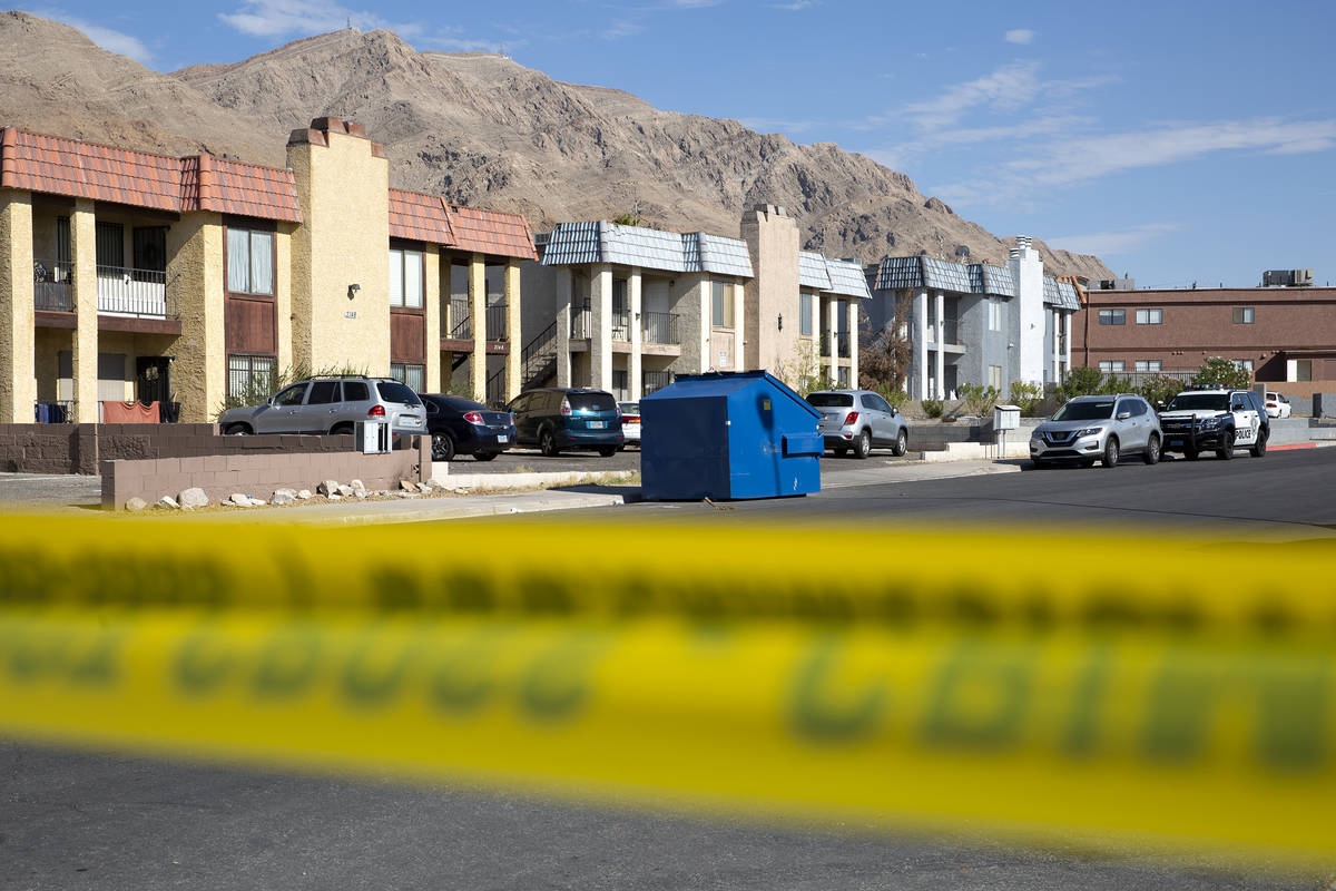 Metropolitan police investigate a homicide in the 6900 block of Mendon Lane in the northeast va ...