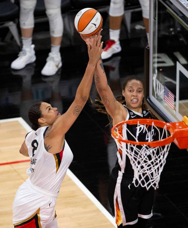 Las Vegas Aces center Liz Cambage (8) blocks a shot by Phoenix Mercury center Brittney Griner ( ...