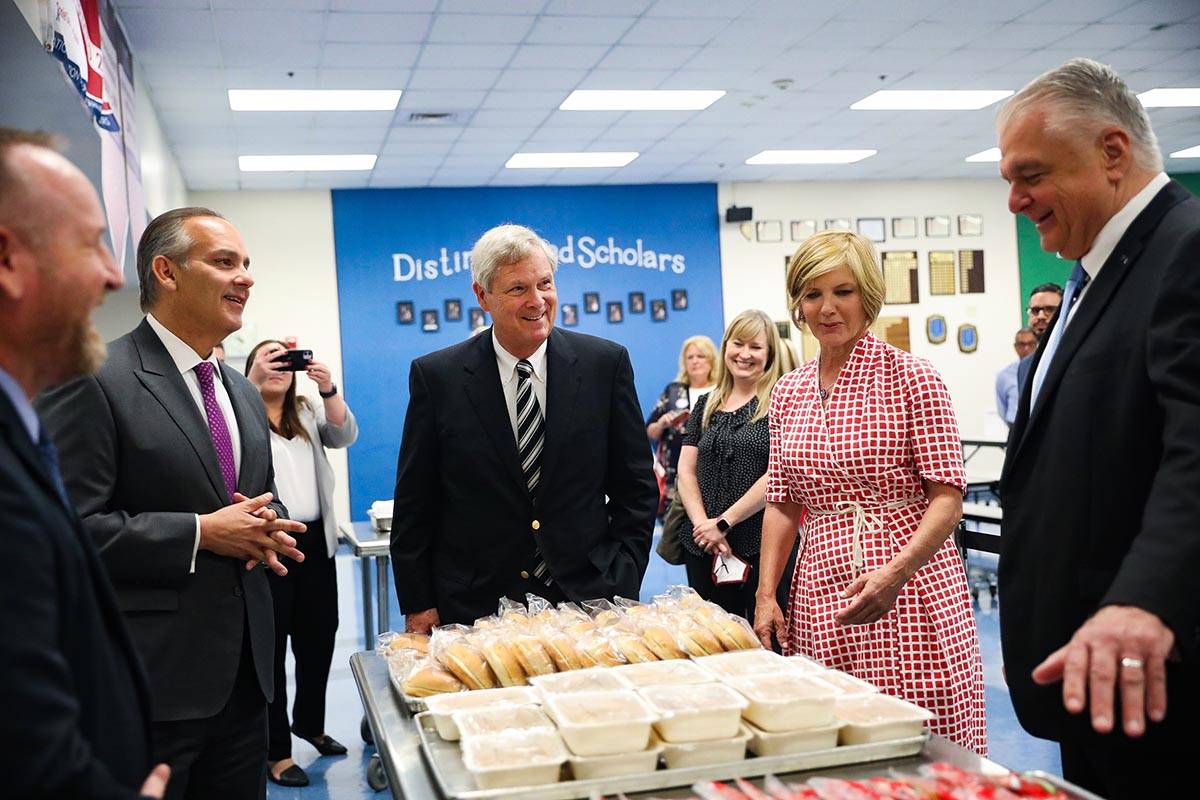 Clark County Superintendent Jesus Jara, from left, talks with Agriculture Secretary Tom Vilsack ...