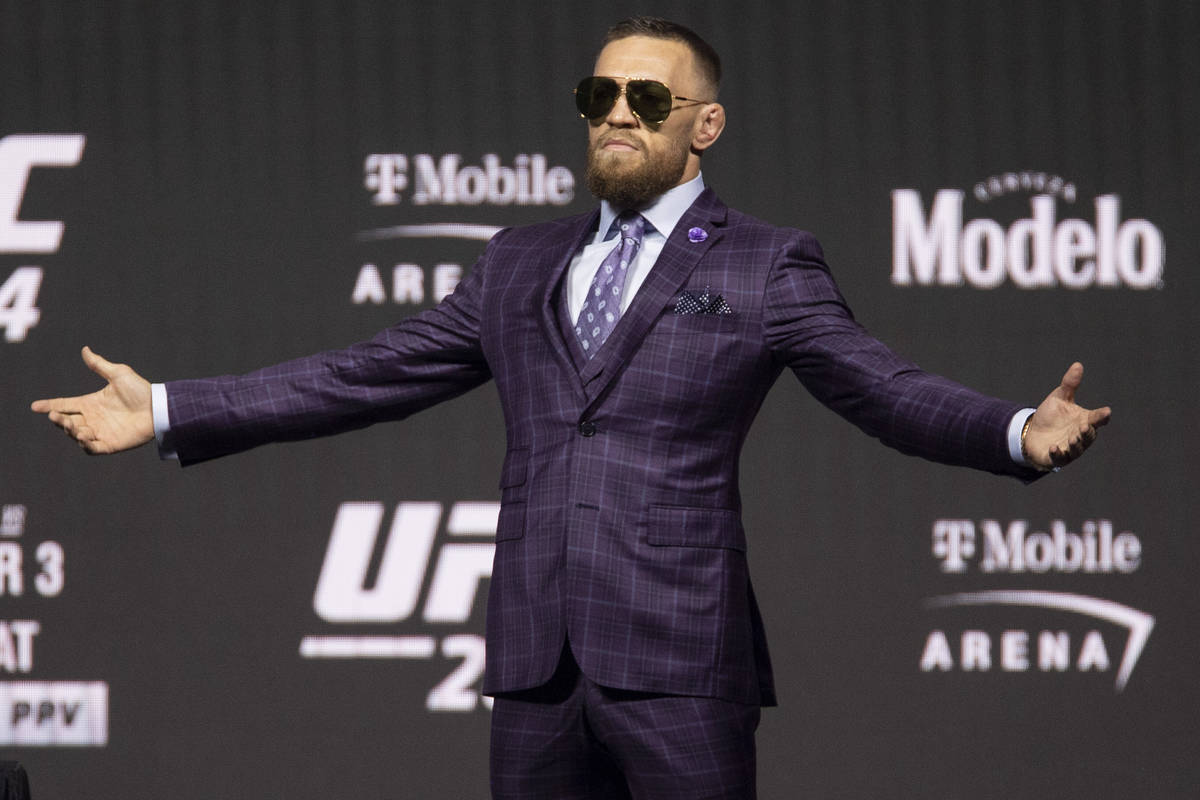 Conor McGregor takes the stage for an UFC 264 press conference at T-Mobile Arena in Las Vegas, ...