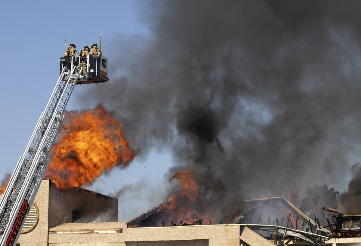 Las Vegas firefighters battle a fire at Bonanza Park Studios on 2221 Bonanza Road, on Friday, J ...