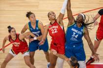 Las Vegas Aces forward A'ja Wilson (22) fights for a tip off with Minnesota Lynx center Sylvia ...