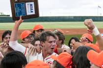 Bishop Gorman High's right fielder Tyler Whitaker joins his teammates as they celebrate their v ...