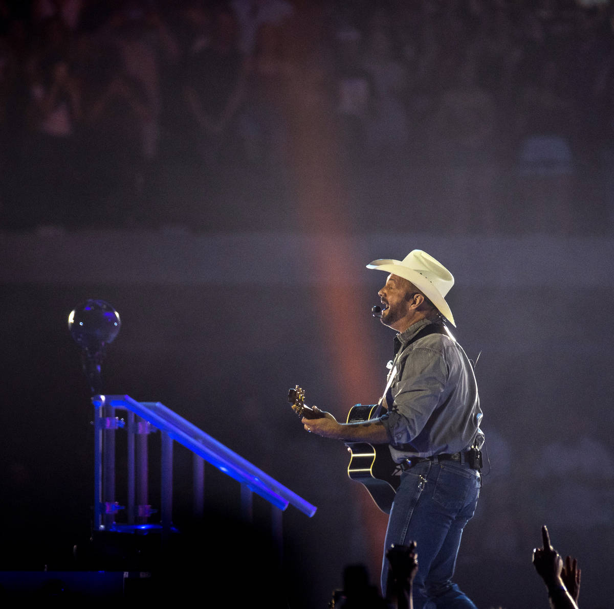 Garth Brooks performs before the crowd at Allegiant Stadium on Friday, July 10 2021, in Las Veg ...