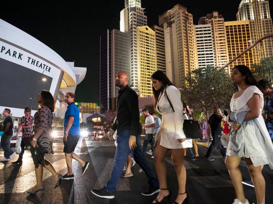 People walk near T-Mobil Arena, on Saturday, July 10, 2021, in Las Vegas. (Bizuayehu Tesfaye/La ...