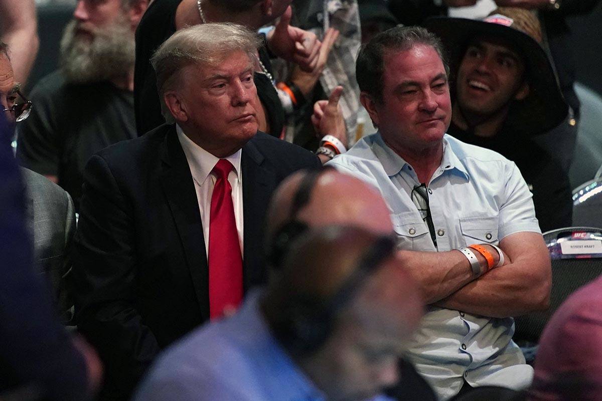 Former U.S. President Donald Trump, left, attends UFC 264, Saturday, July 10, 2021, in Las Vega ...