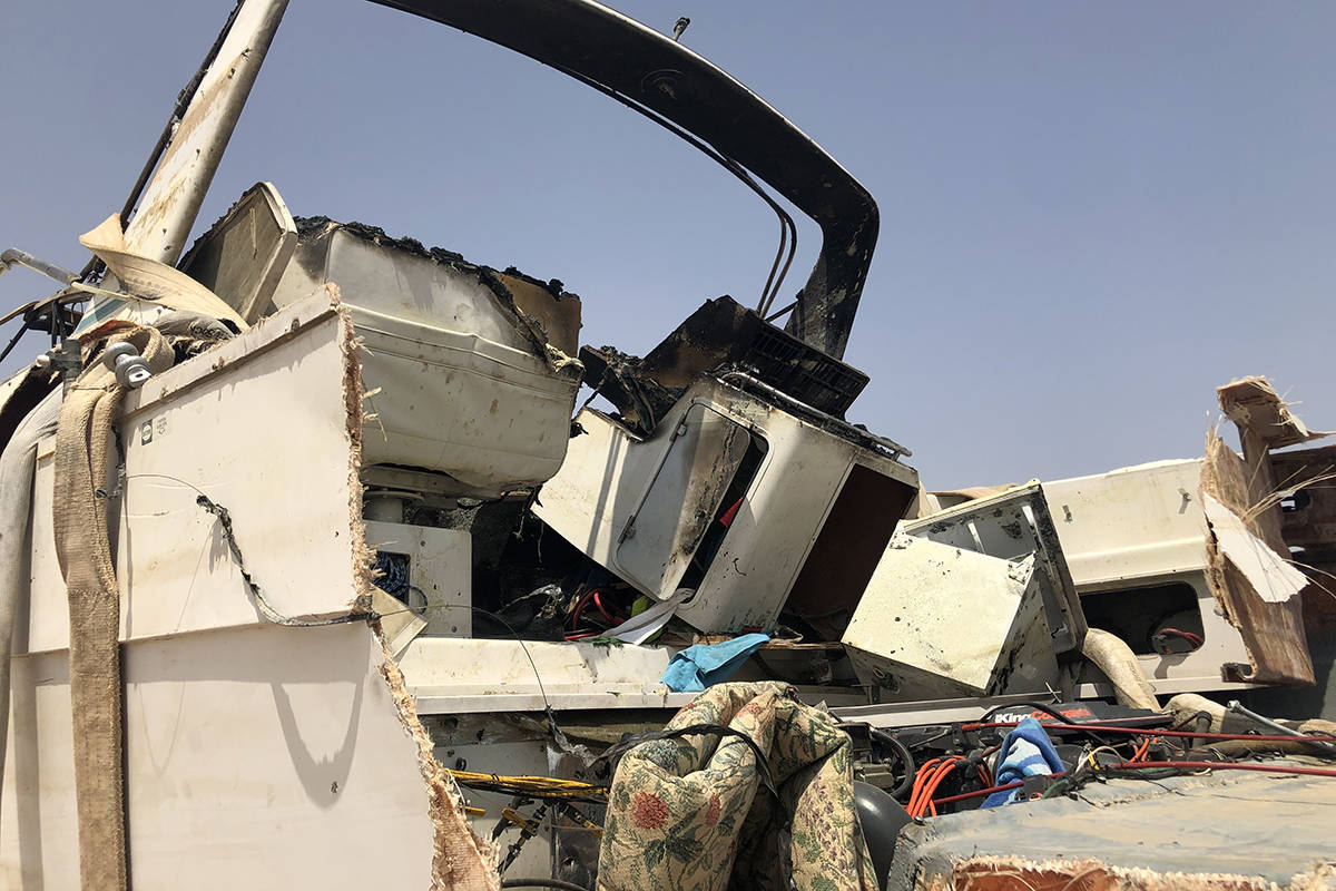 A damaged vessel is seen Sunday, July 11, 2021, outside Las Vegas Boat Harbor at Lake Mead afte ...