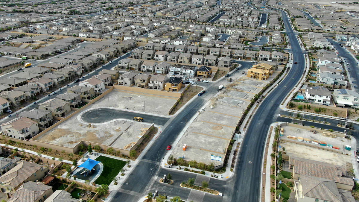 An aerial view of new home construction at Woodlands at Skye Canyon, a housing development near ...