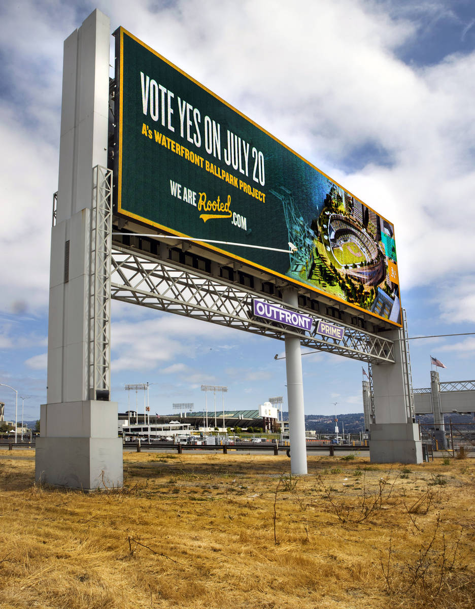 An electronic billboard near RingCentral Coliseum shows the upcoming vote for the Oakland A‘s ...