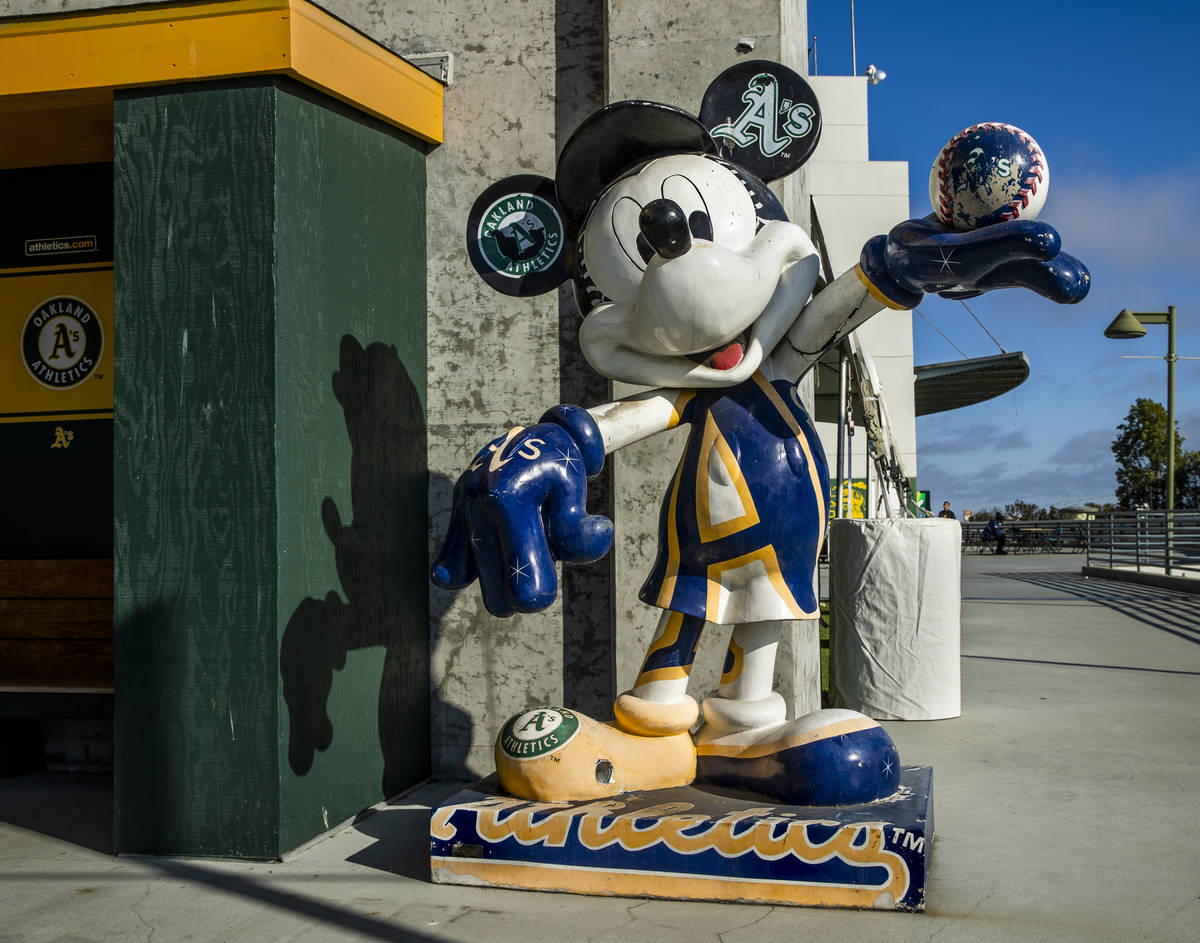 Mickey Mouse as an Oakland A‘s fan is memorialized in statue form outside the concourse ...