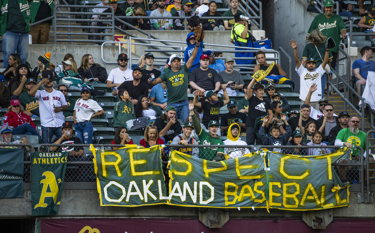 Oakland A‘s fans cheer for their team as they play the Boston Red Sox at RingCentral Coliseum ...