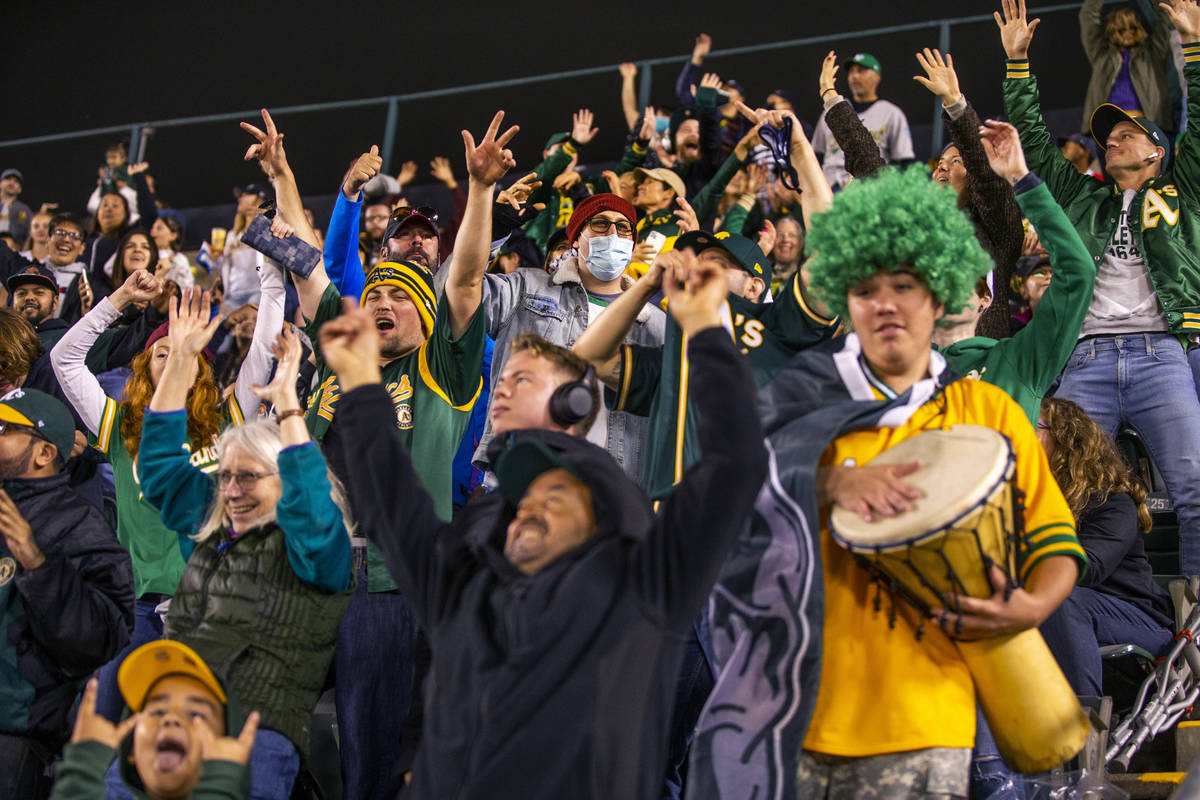 Oakland A‘s fans cheer as the game goes into extra innings against the Boston Red Sox at Ring ...