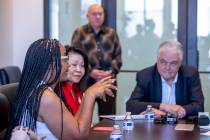 Leahn Crawford with the Urban Chamber of Commerce, left, speaks beside Vida Lin with the Asian ...