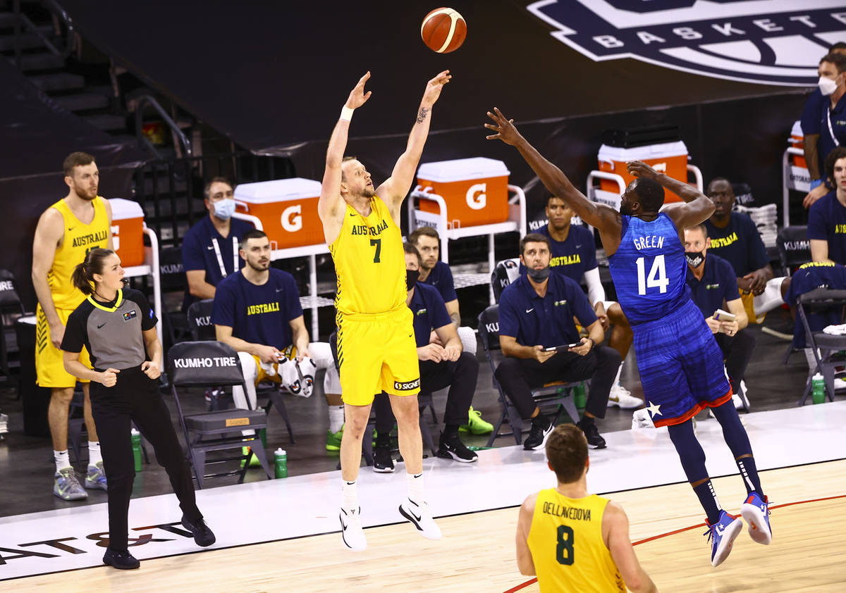 Australia's Joe Ingles (7) shoots under pressure from USA’s Draymond Green (14) during t ...