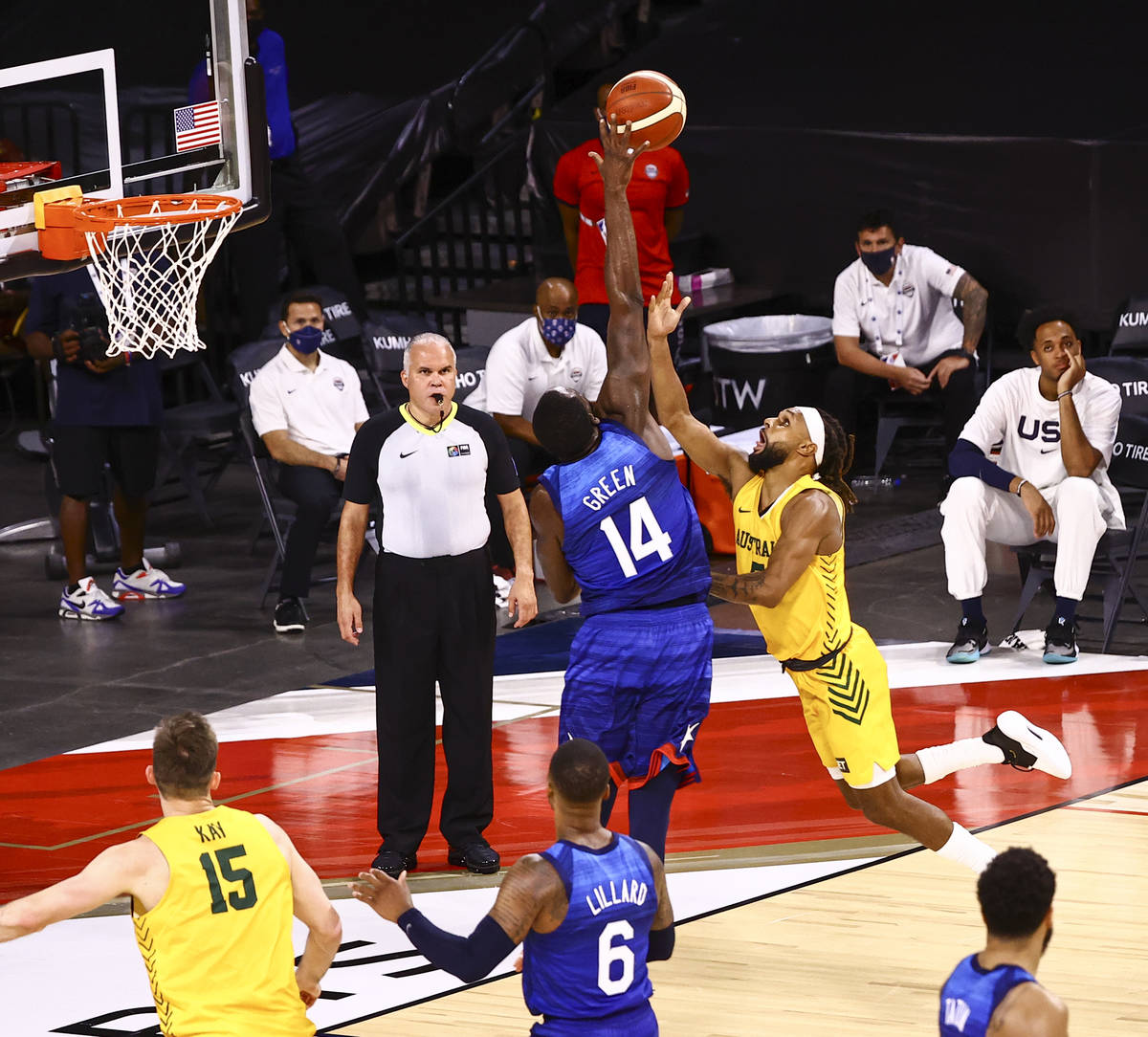 USAճ Draymond Green (14) blocks a shot from Australia's Patty Mills (5) during the second ...