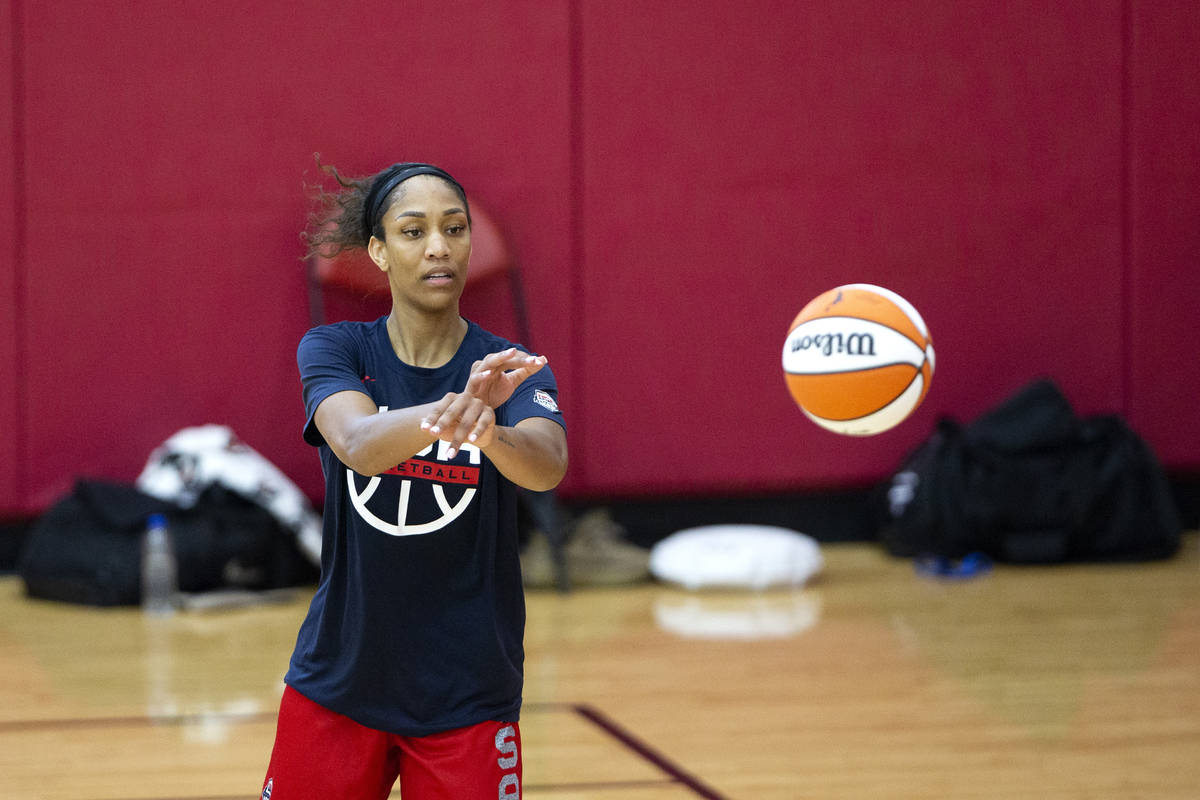 A'ja Wilson, who plays for the Las Vegas Aces in the WNBA, passes the ball during a 2021 USA Ba ...