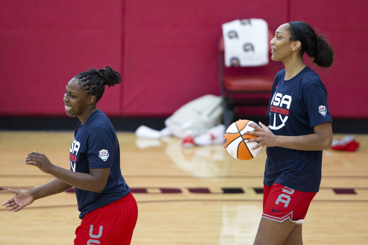 Chelsea Gray, left, and A'ja Wilson, who both play for the Las Vegas Aces in the WNBA, share a ...