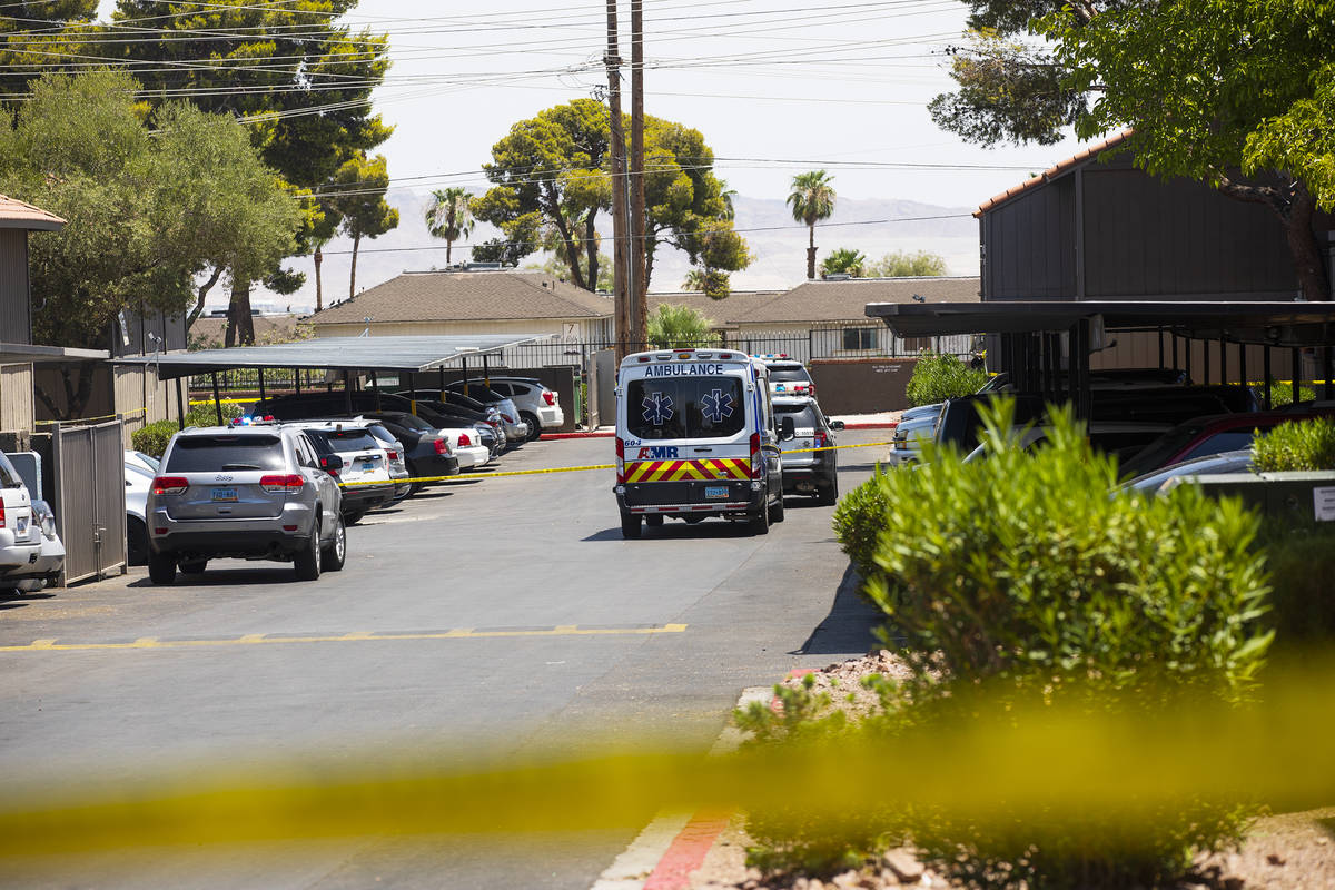 The scene of a homicide investigation in the 1700 block of Karen Avenue in central Las Vegas Tu ...