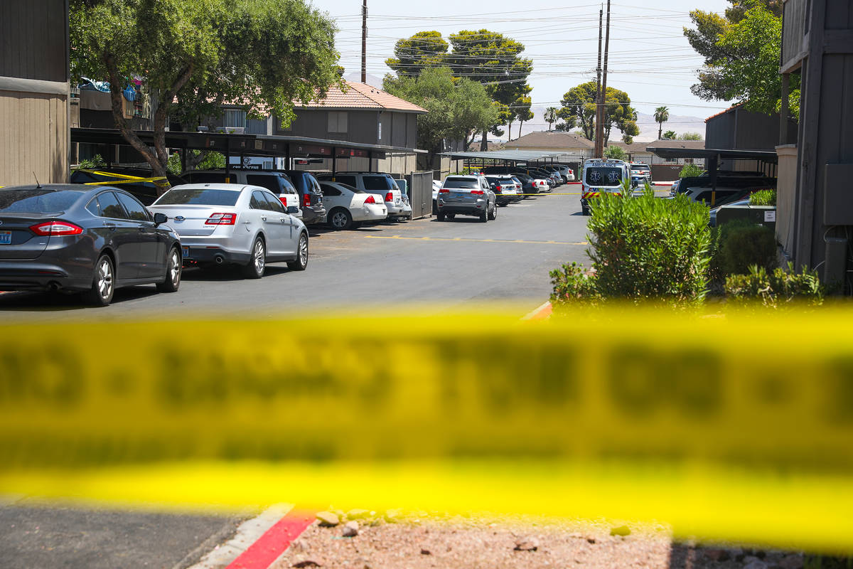 The scene of a homicide investigation in the 1700 block of Karen Avenue in central Las Vegas Tu ...