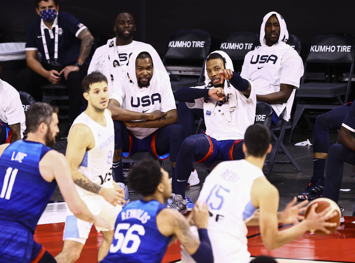 USAÕs Kevin Durant, left, and Damian Lillard talk during the second half of an exhibition ...