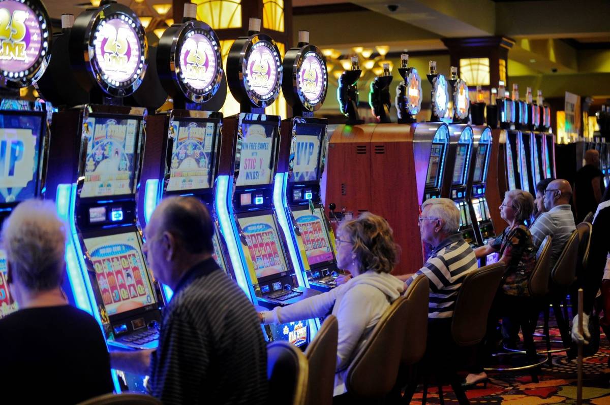 Players enjoy slot machines at Seminole Casino Coconut Creek in Florida in February 2012. (Josh ...
